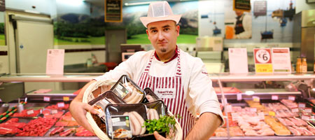 Butcher with superquinn sausages Butcher with superquinn sausages