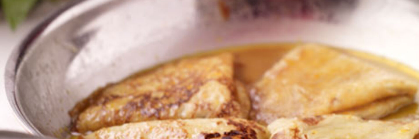 Crêpe Suzette with Strawberries and Ice Cream
