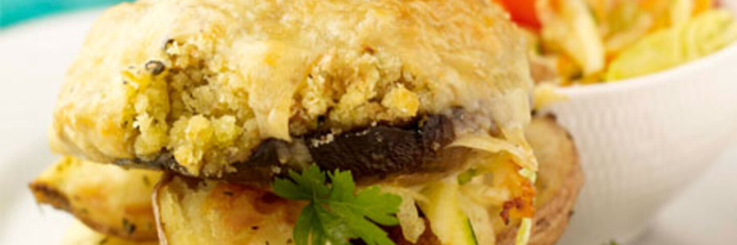 Portobello Mushrooms with Garlic and Courgette Stuffing, Salad and Potato Wedges