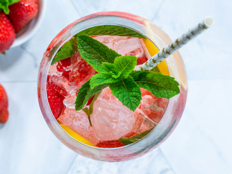 Strwawberry bombay and tonic cocktail